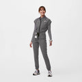Classic Collar Neck- Polished professional appearance that stands out in any healthcare setting. Pop Colored Zipper- Bold, eye- catching in a contrasting color, fun, fashionable Zipper Release- Front zipper, Easy wear and removal, saving you time and ensuring a secure fit Enhanced Stretch- Crafted premium stretch, curvy friendly Pockets-&nbsp; Pockets- 1 chest, 2 side waist, 1side leg, 2 back