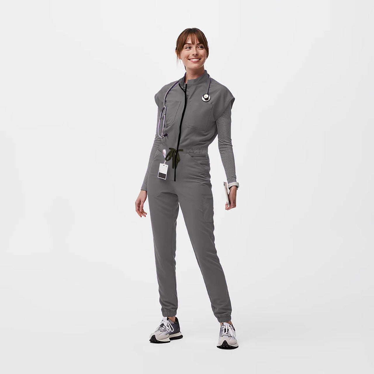 Classic Collar Neck- Polished professional appearance that stands out in any healthcare setting. Pop Colored Zipper- Bold, eye- catching in a contrasting color, fun, fashionable Zipper Release- Front zipper, Easy wear and removal, saving you time and ensuring a secure fit Enhanced Stretch- Crafted premium stretch, curvy friendly Pockets-&nbsp; Pockets- 1 chest, 2 side waist, 1side leg, 2 back